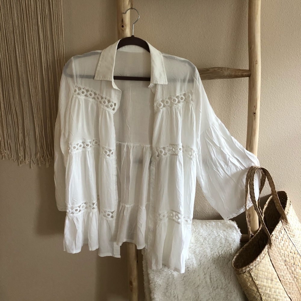White coverup with lace peep-hole detailing
